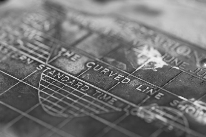 The etched details of a sundial tell how to read it.