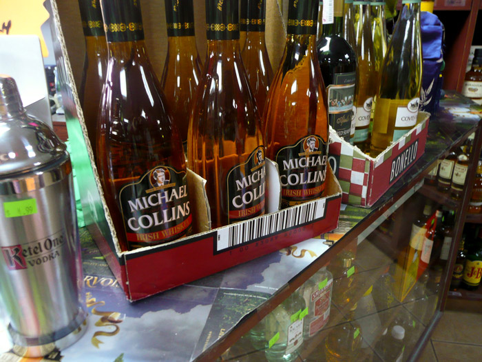 Bottles of Irish Whiskey in a liquor store have been labeled with Michael Collins' name and face.