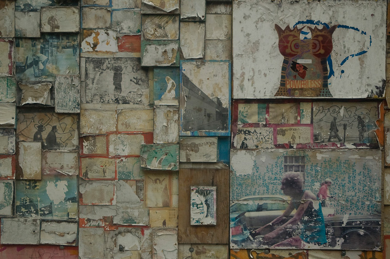 Photos, on wood, stuck on a wall