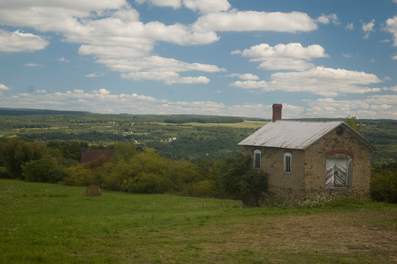 A building in a field.