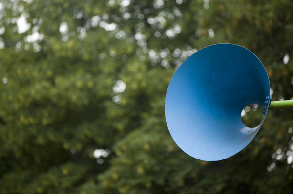 A blue cone, open at both ends, is truncated before
the tip.
